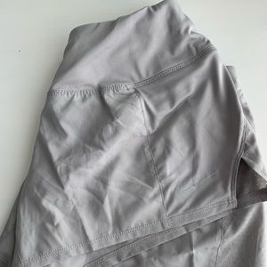 Women’s Silver Nike Dri-Fit shorts